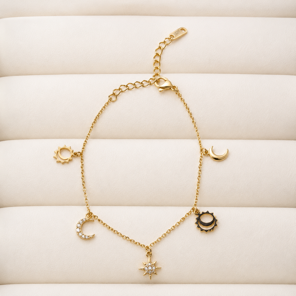 Gold-tone Luneris bracelet with moon, sun and star motifs