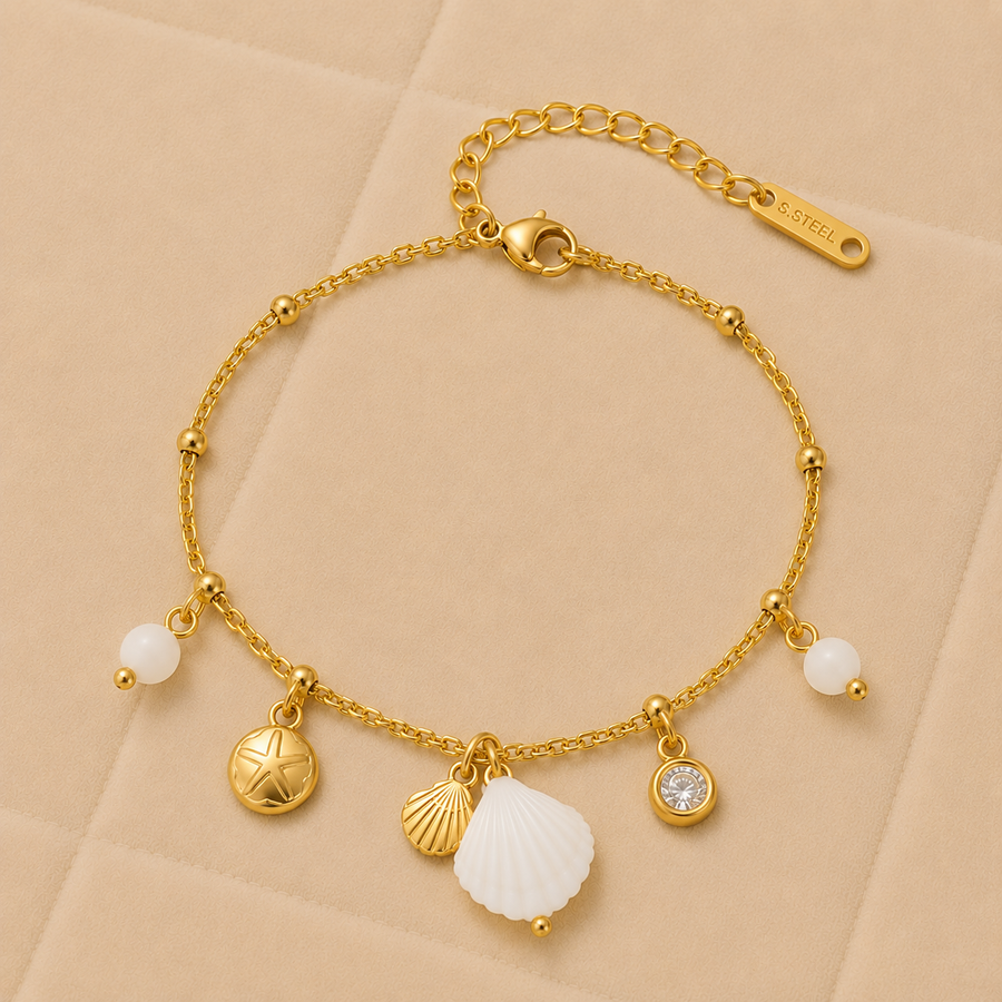 Pulsera Mareluna con perlas de agua dulce y dijes marinos