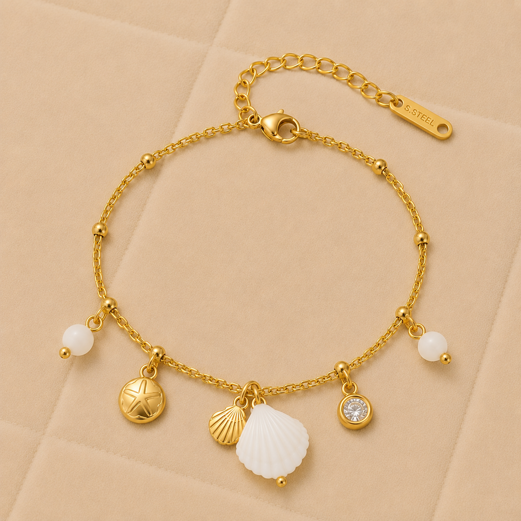 Pulsera Mareluna con perlas de agua dulce y dijes marinos
