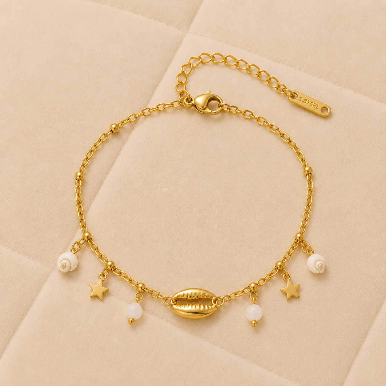 Pulsera Estela Marina con concha central, estrellas y perlas