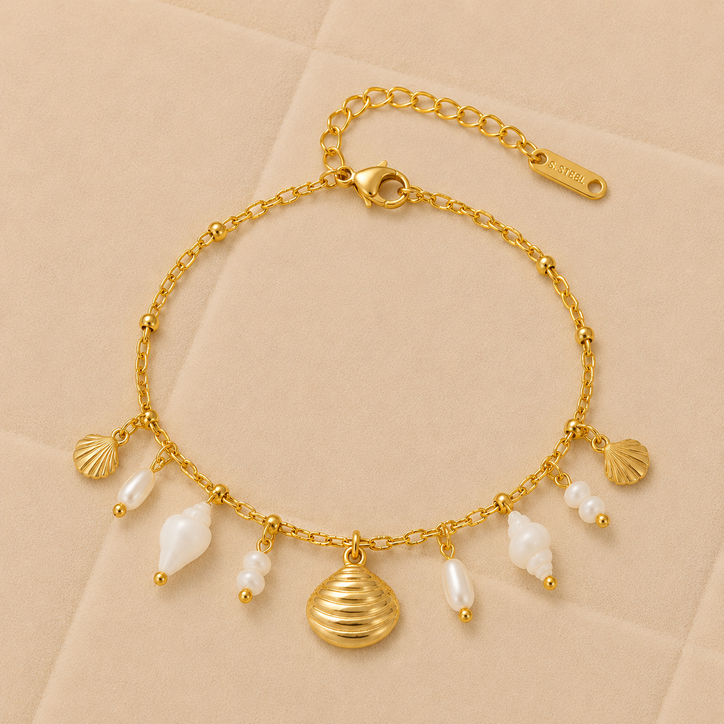 Pulsera Coralia dorada con conchas y perlas de agua dulce